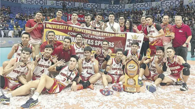  ?? Dennis Abrina ?? Members of the Perpetual Altas celebrate their NCAA Season 98 men’s indoor volleyball title conquest after outclassin­g San Beda University in a winner-take-all Game 3 Finals.
