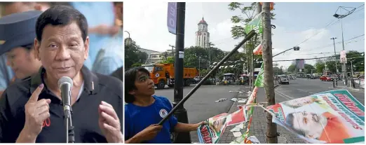  ?? — AP ?? Coming down: A Manila city public worker removing campaign posters, mostly that of incumbent mayor and former president Joseph Estrada who lost in the polls, around the Manila City Hall area.