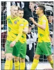  ?? ?? SPOT ON: Sam Barratt, left, celebrates his penalty strike