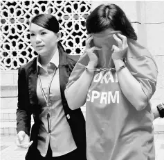  ??  ?? The Vietnamese woman arrived in court. — Bernama photo