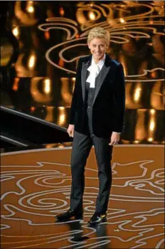  ?? PHOTO BY UOHN SHEARER U INUISION U AP ?? Ellen DeUeneres hosts the Oscars at the Dolby Theatre on Sunday in Los Angeles.