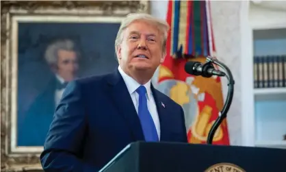  ?? Photograph: Saul Loeb/AFP/Getty Images ?? Trump at the White House on Monday. Pfizer’s vaccine is expected to be endorsed by a panel of regulators from the FDA as soon as this week.