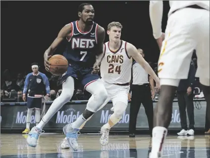  ?? AP PHOTO/BEBETO MATTHEWS ?? Brooklyn Nets forward Kevin Durant (7) drives to the basket against the Cleveland Cavaliers during the second half of an NBA basketball game on Friday in New York.