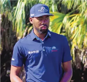  ?? BUSINESS WIRE/AP ?? Kamaiu Johnson, 27, has fought and won his way into his life and profession­al goal: a spot in a PGA tournament. He’ll tee off Thursday in the AT&T Pebble Beach Pro-Am.