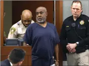  ?? BIZUAYEHU TESFAYE — LAS VEGAS REVIEW-JOURNAL VIA AP ?? Duane “Keffe D” Davis is led into the courtroom at the Regional Justice Center in Las Vegas on Wednesday.