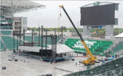  ?? TROY FLEECE ?? Crews continue to prepare for the concert on Saturday at Mosaic Stadium. Gates open at 4 p.m. with Our Lady Peace beginning at 6 p.m.