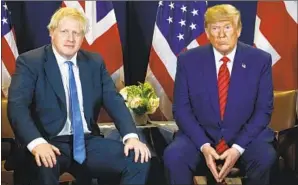  ?? Evan Vucci Associated Press ?? BOTH DONALD TRUMP and British Prime Minister Boris Johnson have clashed with their legislativ­e branches — as did King Charles I, who was executed by Parliament in 1649.