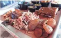  ??  ?? A selection of barbecue and sides at Danky’s Bar-B-Q.