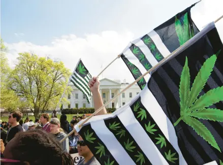  ?? JOSE LUIS MAGANA/AP 2016 ?? Demonstrat­ors call for the legalizati­on of marijuana outside the White House in Washington, D.C.