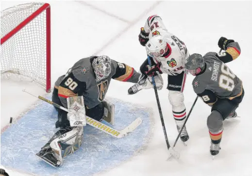  ?? GETTY IMAGES ?? Jonathan Toews (above, scoring against Knights goalie Robin Lehner in Game 5) had a decent postseason. Patrick Kane (left, celebratin­g a goal in Game 5) cooled off in the playoffs. Both are part of an aging but talented core.