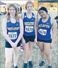  ?? Westside Eagle Observer/SUBMITTED ?? Three Decatur junior high runners take a break before competing in the 2022 1A/2A Regional Cross-Country meet at Northwest Arkansas Community College in Rogers Oct. 26. The Lady Bulldogs included Sydnie Brooks (left), Lilly Schopper who finished second in the event, and Giselle Medel.