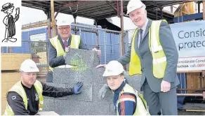  ??  ?? Flashback From back left council leader Jim Logue and housing convener Barry McCulloch at launch of ambitious project last November