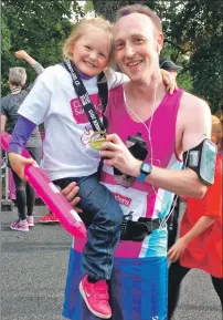  ??  ?? Michael McGuire, pictured with daughter Ameile, is running in honour of his son.