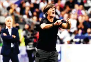  ?? ANNE-CHRISTINE POUJOULAT/AFP ?? Germany head coach Joachim Low gestures during their UEFA Nations League match with France at the Stade de France on Tuesday night.