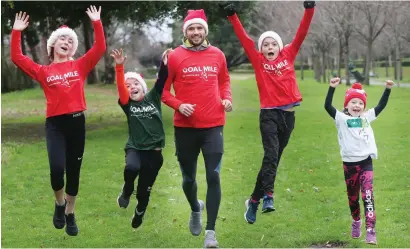  ??  ?? Dublin star Cian O’Sullivan with Caoimhe (13), Rossa (9), Cuan (11) and Saoirse (6) Moore at the launch of the 37th GOAL Mile in Dublin. People of all ages are encouraged to join their local mile this Christmas – visit www.goalmile.org for details
