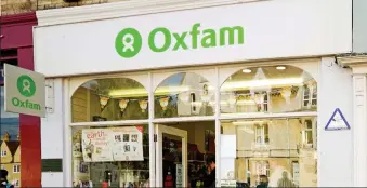  ??  ?? Familiar sight: Oxfam’s first shop in Oxford. There are now 1,200 worldwide