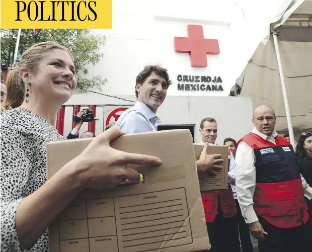  ?? SEAN KILPATRICK / THE CANADIAN PRESS ?? Prime Minister Justin Trudeau and wife Sophie Grégoire Trudeau help with earthquake relief at the Red Cross in Mexico City on Thursday.