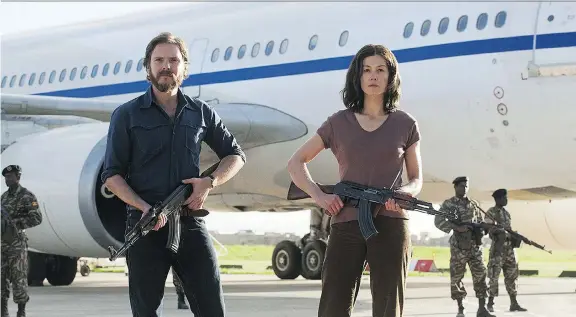  ?? FOCUS FEATURES ?? The newest version of 7 Days in Entebbe — the fourth time the story has been told on screen — features Daniel Brühl, left, and Rosamund Pike.