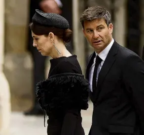  ?? PHOTO: REUTERS ?? Prime Minister Jacinda Ardern and her partner Clarke Gayford arrive at the abbey.