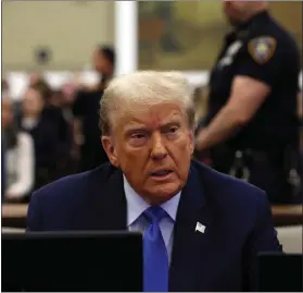  ?? BRENDAN MCDERMID - VIA THE ASSOCIATED PRESS ?? Former President Donald Trump waits to take the witness stand during his civil fraud trial at New York Supreme Court on Monday in the city.