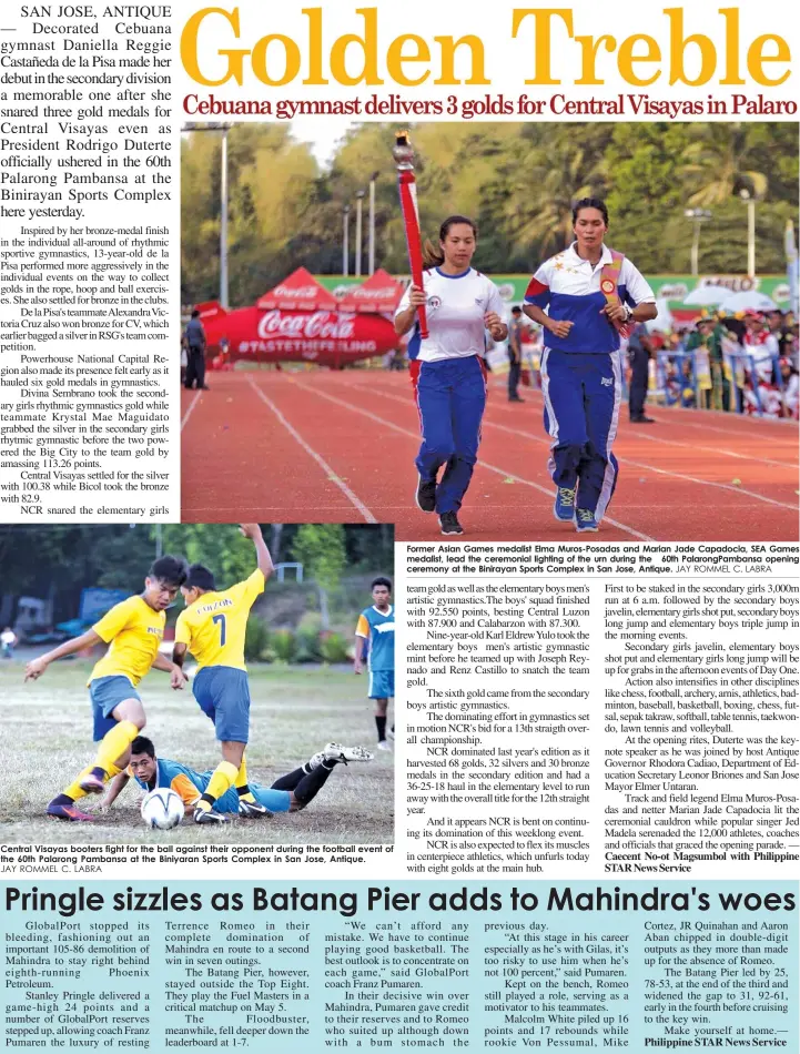  ?? JAY ROMMEL C. LABRA ?? Central Visayas booters fight for the ball against their opponent during the football event of the 60th Palarong Pambansa at the Biniyaran Sports Complex in San Jose, Antique. Former Asian Games medalist Elma Muros-Posadas and Marian Jade Capadocia,...