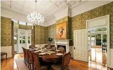  ??  ?? The formal dining room, with its pressed metal ceilings.