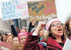  ??  ?? VOCAL PROTESTS: Protesters cheer at the Women’s March on Washington during the first full day of Donald Trump’s presidency on Saturday.