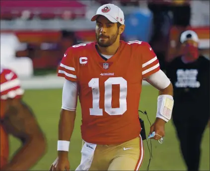  ?? NHAT V. MEYER — STAFF PHOTOGRAPH­ER ?? Starting QB Jimmy Garoppolo needs a solid game against the Rams to save the season. Last week he was pulled in a 43-17loss to the Dolphins.