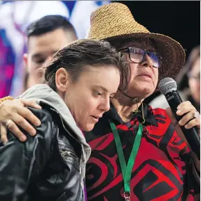  ?? DARRYL DYCK/THE CANADIAN PRESS ?? Bernie Williams, right, who has been an outspoken advocate for women in Vancouver’s Downtown Eastside for 30 years, embraces Carmen Paterson while testifying at the final day of hearings at the National Inquiry into Missing and Murdered Indigenous...