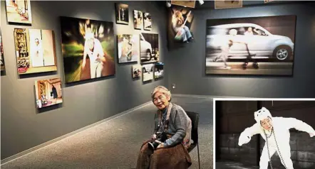  ?? — AFP ?? A thousand words: Nishimoto (top) posing with a camera on the opening day of her photo exhibition in Tokyo. (Right) Nishimoto dressed in a dog costume.