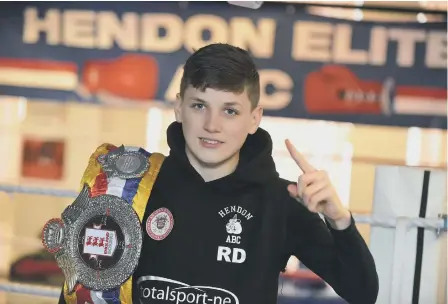  ??  ?? Robert Dunn with his ABA championsh­ip belt.