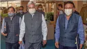  ?? — PTI ?? Chief Election Commission­er Sunil Arora, election commission­ers Sushil Chandra (left) and Rajiv Kumar arrive for a press conference in New Delhi on Friday.