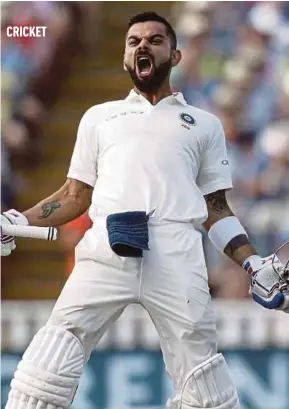  ?? AFP PIC ?? India captain Virat Kohli celebrates his century on the second day of the First Test on Thursday.