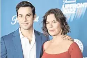  ?? ANTHONY BEHAR Sipa USA/USA TODAY NETWORK ?? Skylar Astin, left, and Marcia Gay Harden, the stars of “So Help Me Todd,” attend an event on May 18, 2022, in New York. The CBS comedy-drama has been canceled after two seasons, reportedly because the network did not have room in a crowded schedule.
