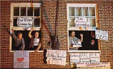  ?? REUTERS PIC ?? Supporters of Venezuelan President Nicolas Maduro protesting at the Venezuelan embassy in Washington, DC, on Monday.