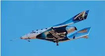  ?? Associated Press ?? ■ Virgin Galactic is seen Dec. 13, 2018, prior to it reaching space for the first time during its fourth powered flight from Mojave, Calif.