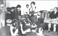 ?? NEW YORK TIMES HANDOUT VIA THE ?? The Rising Storm, a garage-rock band, at a gig in 1967.