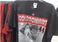  ??  ?? Shirts with the image of former Diamondbac­ks player Paul Goldschmid­t were on clearance during Fan Fest on Saturday.