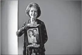  ?? FILE PHOTO] [DISPATCH ?? Pamela Whitelock of New Albany shows a photo of her uncle, Ewart Sconiers, and his widow, Bobelle Sconiers Harrell. “This is such a powerful story in so many ways about the price of freedom and the human impact of war,” said Whitelock, 69. “The...