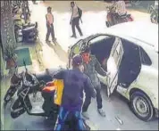  ??  ?? CCTV footage shows kidnappers dragging a 60yearold man into a car in Udaipur on Monday.