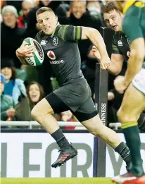  ??  ?? Winging in: Andrew Conway scores Ireland’s first try