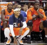  ?? KATHY WILLENS — THE ASSOCIATED PRESS ?? 3’s Company player/captain and coach Allen Iverson, center, kneels on the sideline during the first half of Game 3 in the BIG3 Basketball League debut Sunday at the Barclays Center in New York.