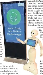  ?? F.: SEVENS ?? Roboter Pepper kontrollie­rt am Eingang zum Sevens an der Kö die Maskenpfli­cht.