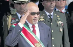  ?? REUTERS ?? Suriname’s President Desi Bouterse salutes during a military parade following his swearing in to a second consecutiv­e term in Paramaribo.