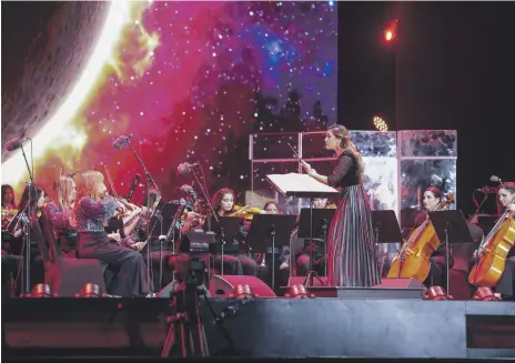  ?? ?? Conductor Yasmina Sabbah led the orchestra through a space-themed repertoire before Rahman took over for an original piece