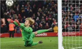  ?? Photograph: John Powell/Liverpool FC/Getty Images ?? Liverpool’s Caoimhín Kelleher makes in the Carabao Cup quarter-final against Leicester.
