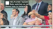  ??  ?? HELPLESS: Gareth Bale watches on as Wales lose to Ireland