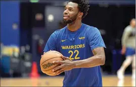  ?? JEFF CHIU / AP ?? Golden State Warriors forward Andrew Wiggins shoots during NBA basketball practice in San Francisco on Tuesday.