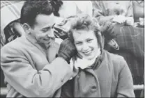  ?? COURTESY OF THE ROBERTSON FAMILY ?? Don and Helen Robertson, Nov. 9, 1957. It is shortly after they met and it is at a U of T football game at Varsity Stadium in Toronto.