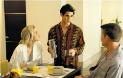  ?? Ray Mickshaw / FX ?? Left: Annaleigh Ashford (left), Darren Criss and Nico EversSwind­ell in the FX miniseries “The Assassinat­ion of Gianni Versace: American Crime Story,” which is told in a reverse chronology.